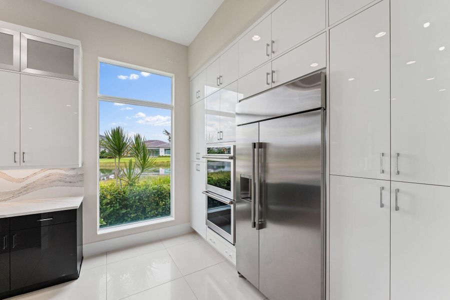 Furnished interior view inside a new home in Coral Isles at Avenir, Palm Beach Gardens (Image 23).