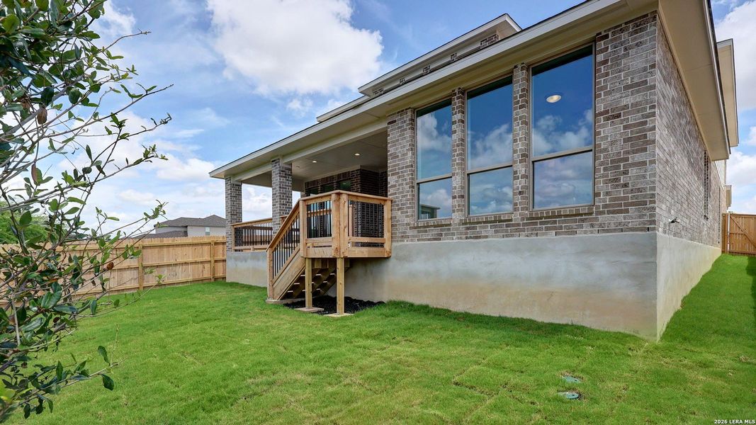 Exterior details and patio area of a home in Ladera, San Antonio (Image 18).