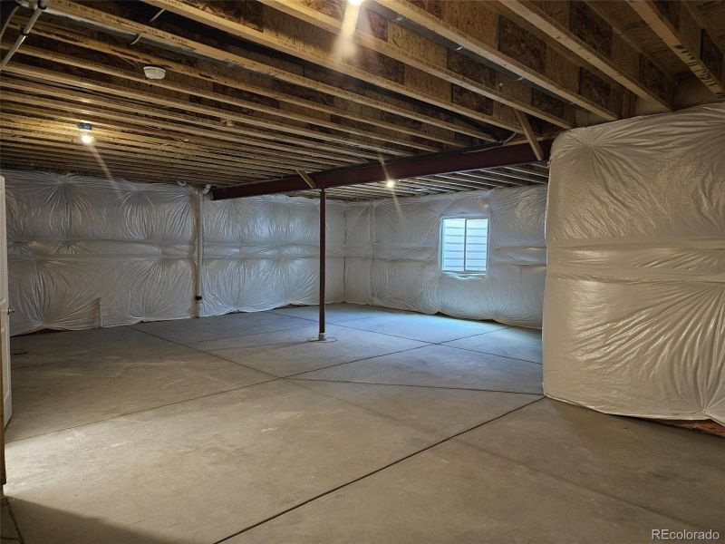 In-progress construction of a new home in The Cottages Collection at Ridgeline Vista, Brighton, CO (Image 21).