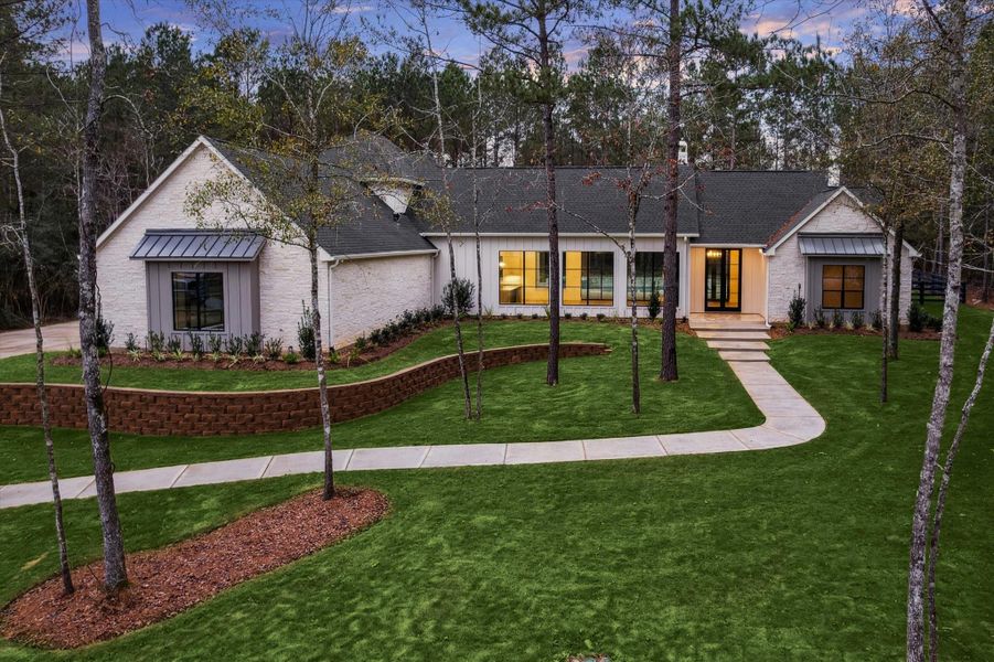 Front exterior of a new home in , Montgomery, TX, highlighting curb appeal (Image 25).