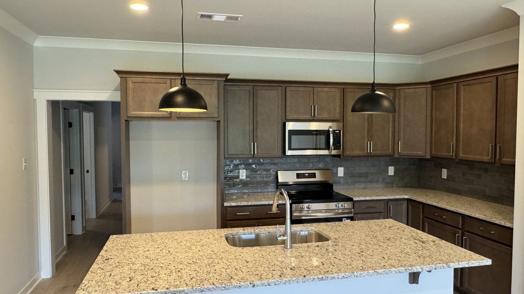 Furnished interior view inside a new home in The Greens at Legacy Townhomes, Springfield (Image 6).