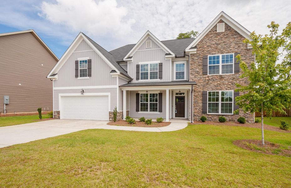 Representative exterior photo of a completed home built from the Springfield V by Ivey Homes in Windsor, North Augusta, SC (Image 26). Representative exterior photo of a completed home built from the Springfield V by Ivey Homes in Windsor, North Augusta, SC (Image 26).