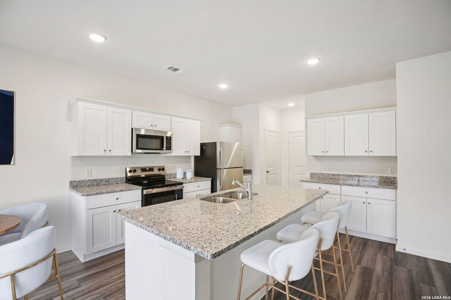 Furnished interior view inside a new home in Roosevelt Heights, San Antonio (Image 7).
