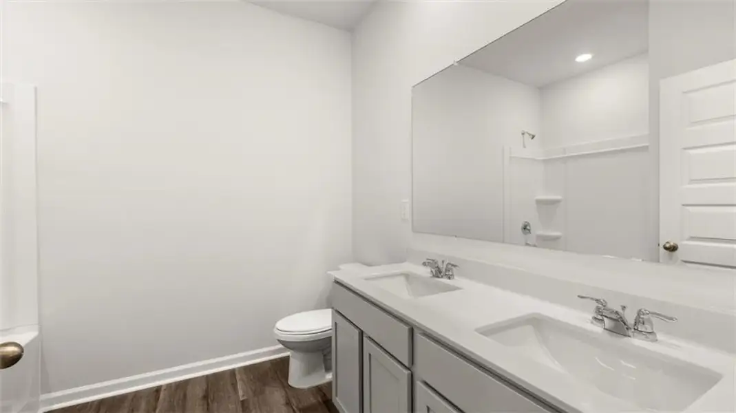 Furnished interior view inside a new home in Preserve at Dove Creek, Statham (Image 13).