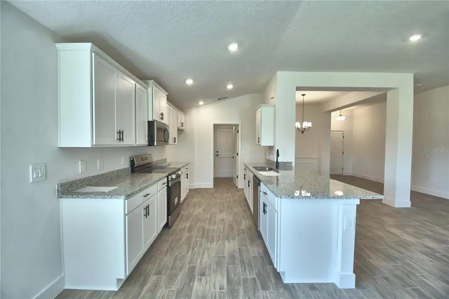 Furnished interior view inside a new home in Lake Juliana Estates, Auburndale (Image 8).
