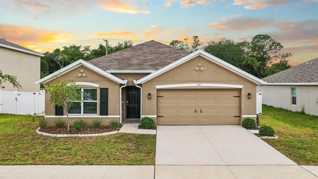 Front exterior of a new home in Brookside, Ruskin, FL, highlighting curb appeal (Image 30).