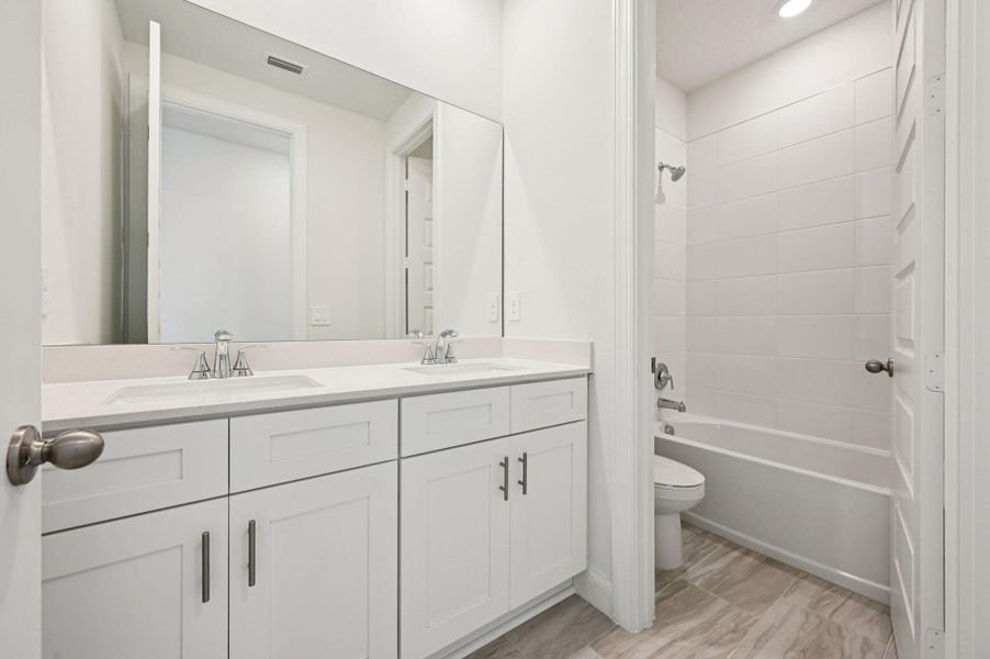 Furnished interior view inside a new home in Brystol at Wylder - Reserve Series, Port St. Lucie (Image 12).