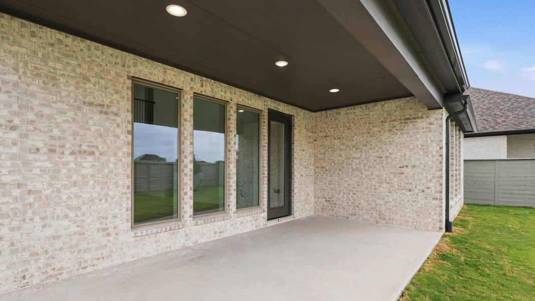 Exterior details and patio area of a home in Ramble, Celina (Image 3). Exterior details and patio area of a home in Ramble, Celina (Image 3).