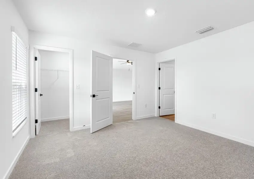 The master bedroom is the perfect place to unwind after a long day