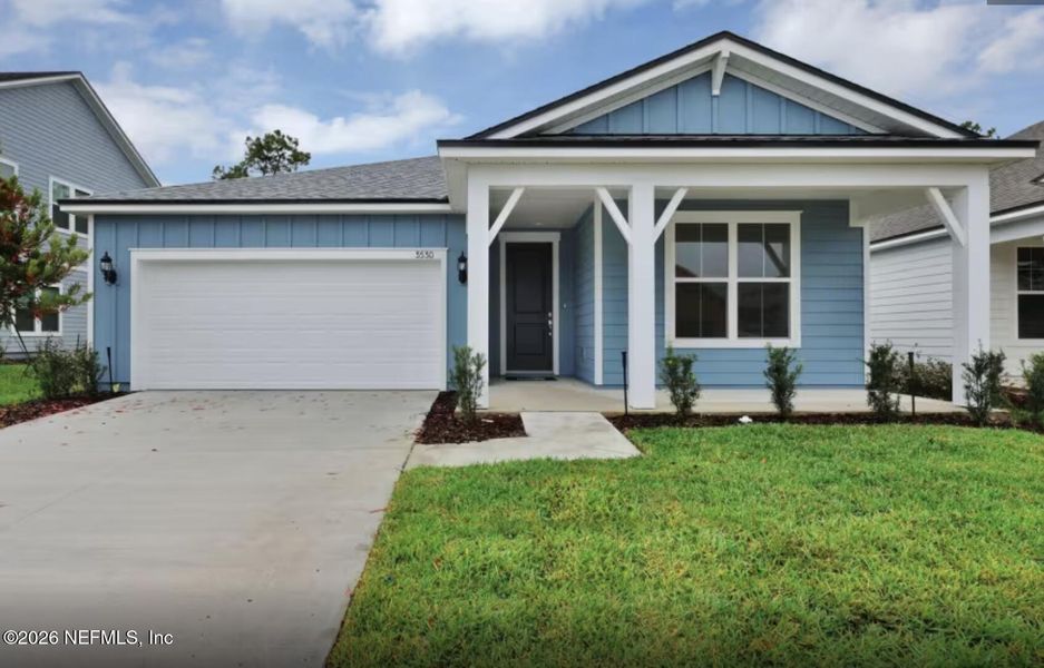 Front exterior of a new home in Hyland Trail, Green Cove Springs, FL, highlighting curb appeal (Image 21).