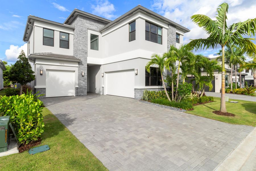 Front exterior of a new home in , Boca Raton, FL, highlighting curb appeal (Image 33). Front exterior of a new home in , Boca Raton, FL, highlighting curb appeal (Image 33).