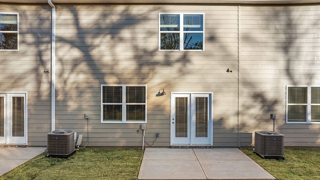 Exterior details and patio area of a home in Laurel Park Townhomes, Hephzibah (Image 4).