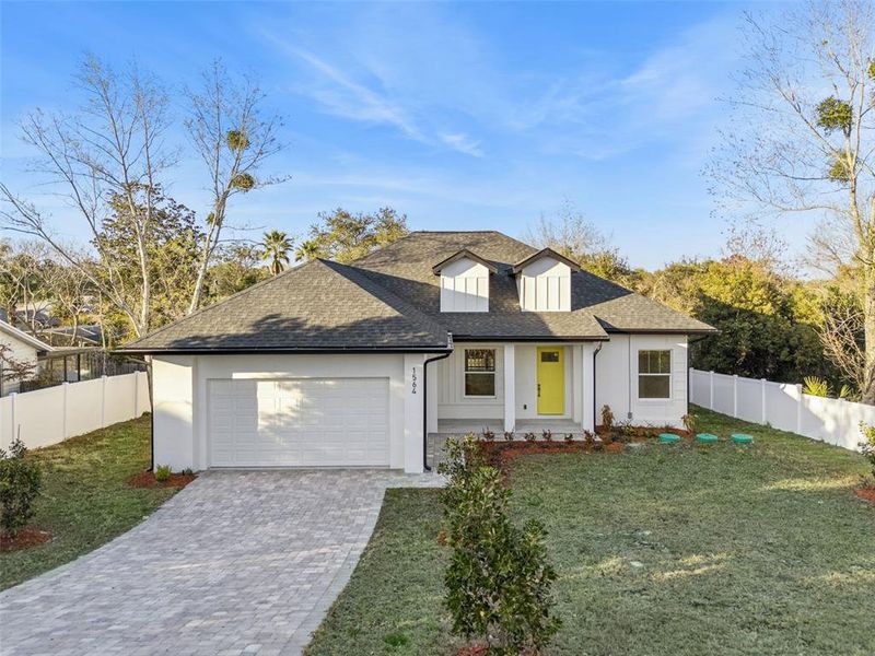 Front exterior of a new home in , Deltona, FL, highlighting curb appeal (Image 1). Front exterior of a new home in , Deltona, FL, highlighting curb appeal (Image 1).