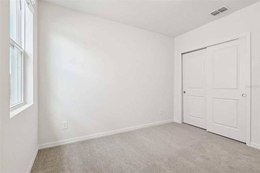 Spacious, unfurnished interior of a new home in Crosswinds - Signature Series, Haines City (Image 28).