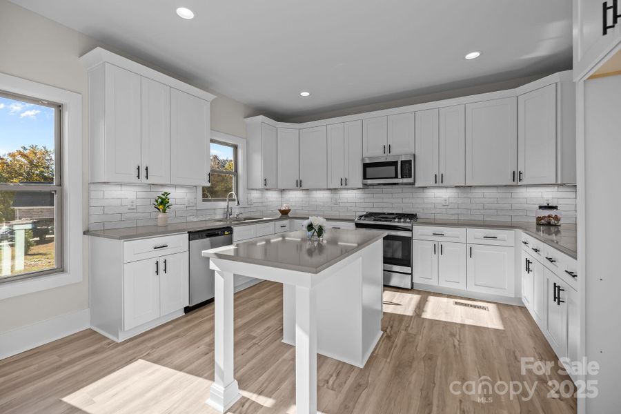 Furnished interior view inside a new home in , Monroe (Image 10).