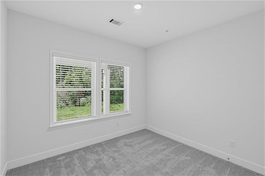 Spacious, unfurnished interior of a new home in , Woodstock (Image 18).