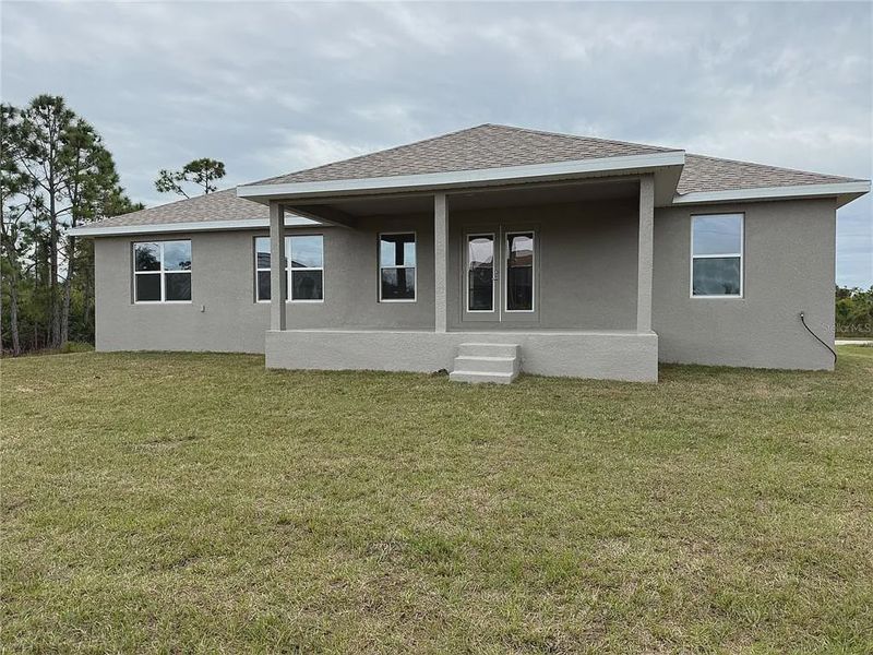 Exterior details and patio area of a home in South Gulf Cove, Port Charlotte (Image 3).