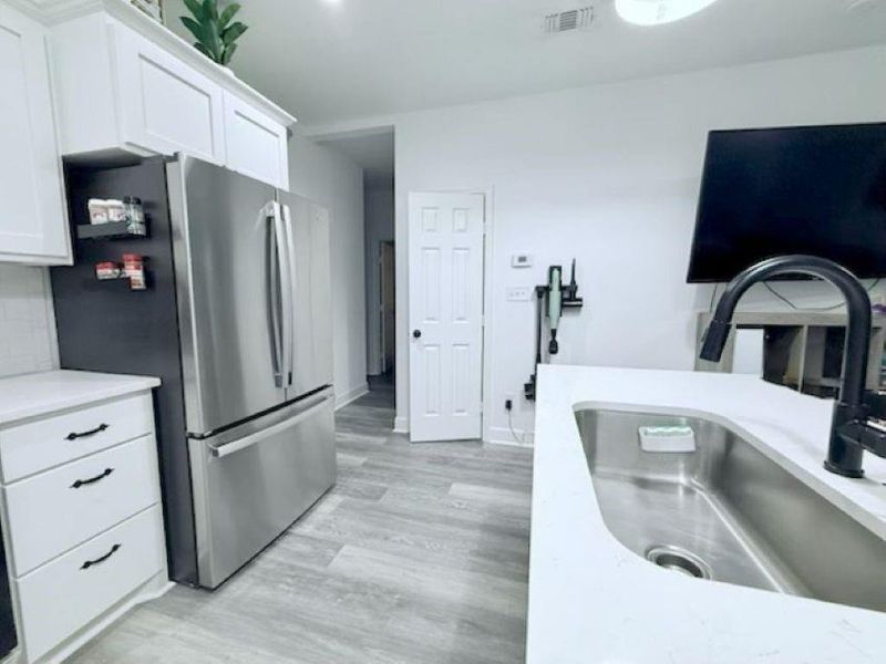 Furnished interior view inside a new home in , Brenham (Image 23).