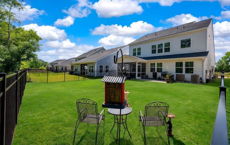 Exterior details and patio area of a home in , Johns Island (Image 3).