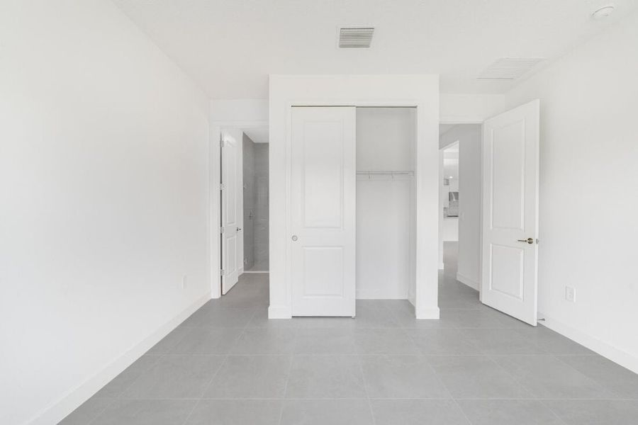 Spacious, unfurnished interior of a new home in Harvest at Ovation, Winter Garden (Image 35).