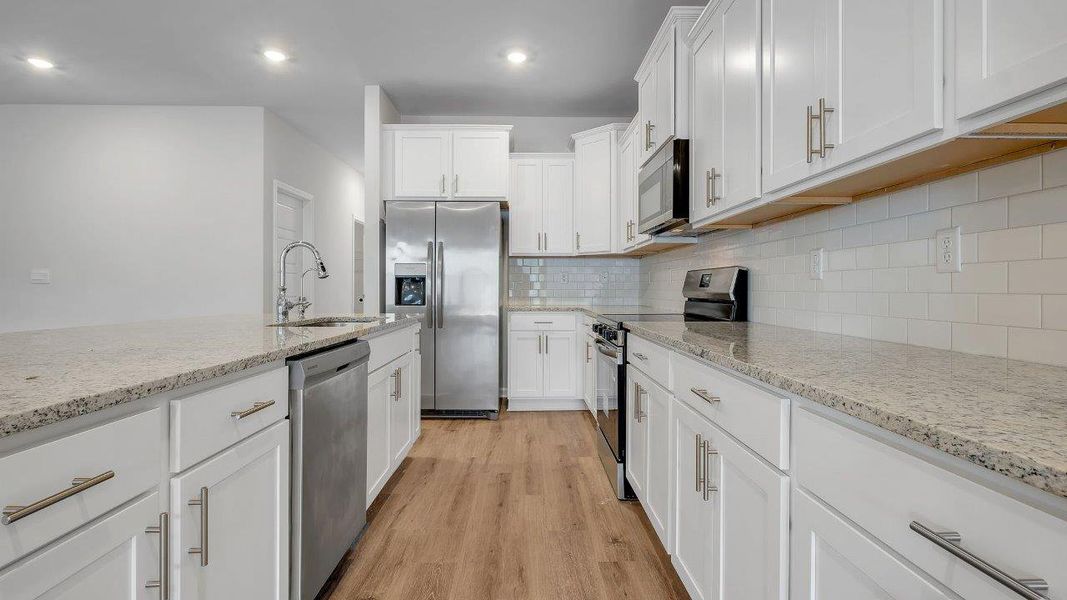 Representative furnished interior of a home built from the The Mckenzie by D.R. Horton in Greystone, Crawfordville (Image 11).