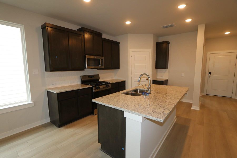 Furnished interior view inside a new home in , Cypress (Image 5).