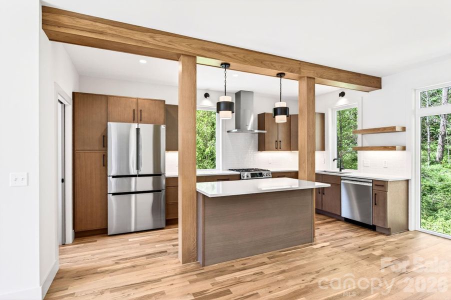Modern Kitchen Features Quartz and Stainless Steel