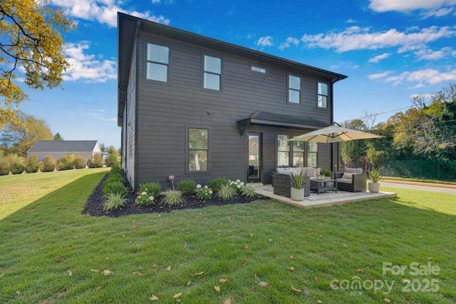 Exterior details and patio area of a home in , Charlotte (Image 3).