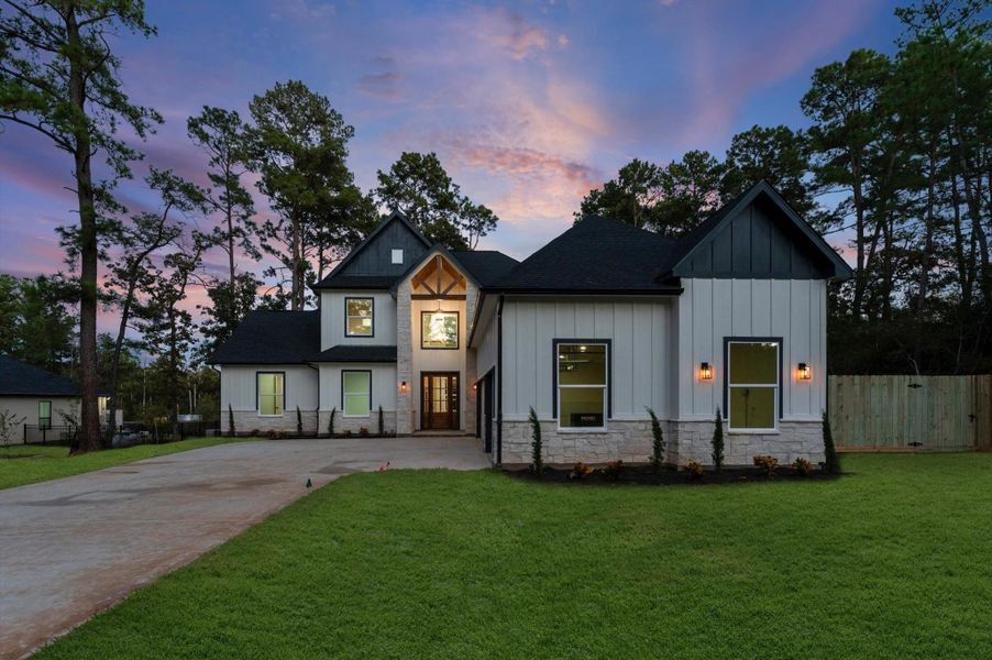 Front exterior of a new home in , Magnolia, TX, highlighting curb appeal (Image 23).