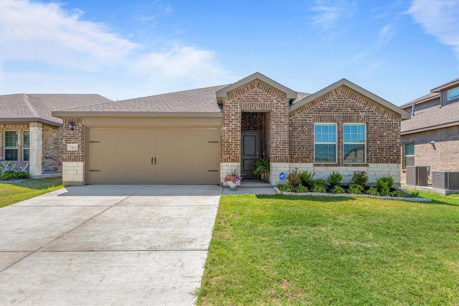 Front exterior of a new home in Millstone, McKinney, TX, highlighting curb appeal (Image 21). Front exterior of a new home in Millstone, McKinney, TX, highlighting curb appeal (Image 21).
