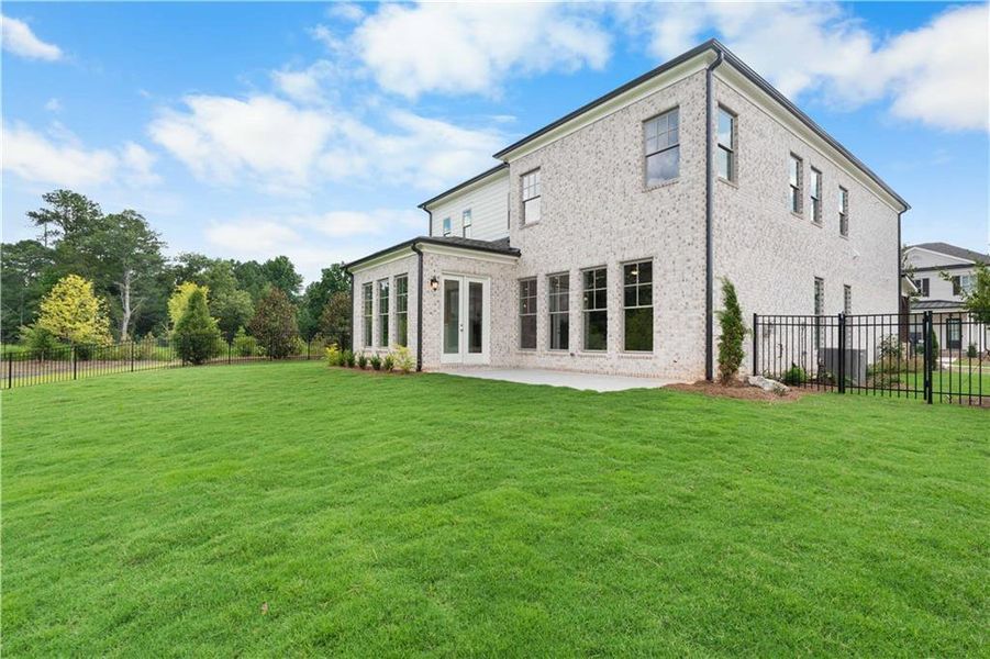 Front exterior of a new home in Knollwood, Johns Creek, GA, highlighting curb appeal (Image 25).