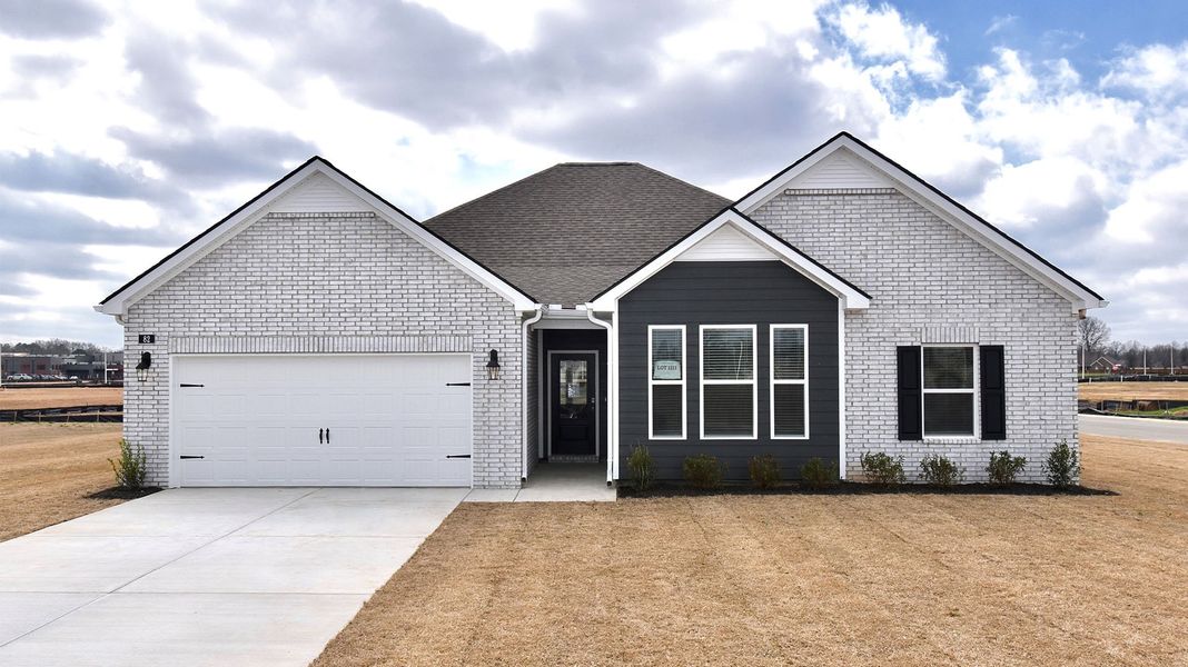 Front exterior of a new home in Shiloh Springs, Jackson, TN, highlighting curb appeal (Image 1). Front exterior of a new home in Shiloh Springs, Jackson, TN, highlighting curb appeal (Image 1).