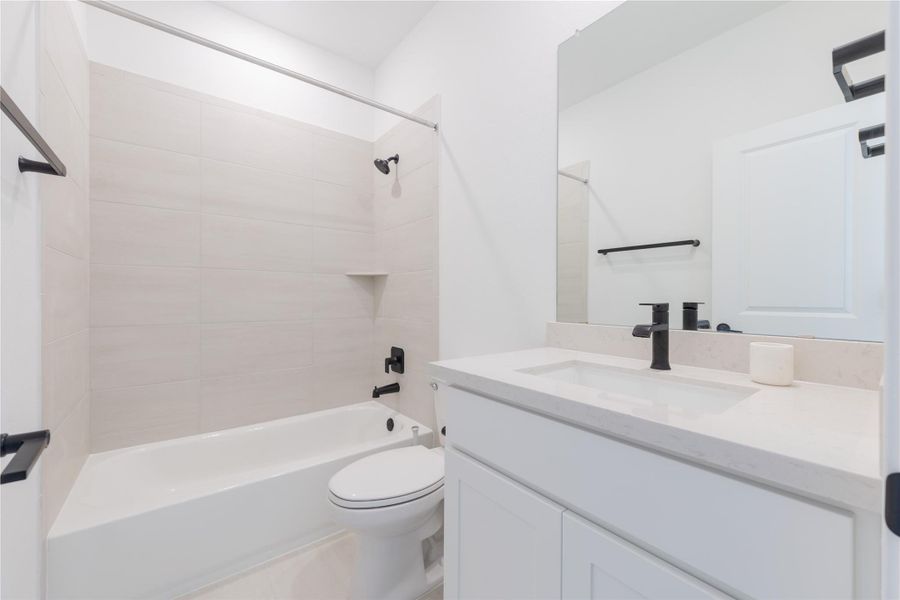 Full bath with  shower combination and vanity