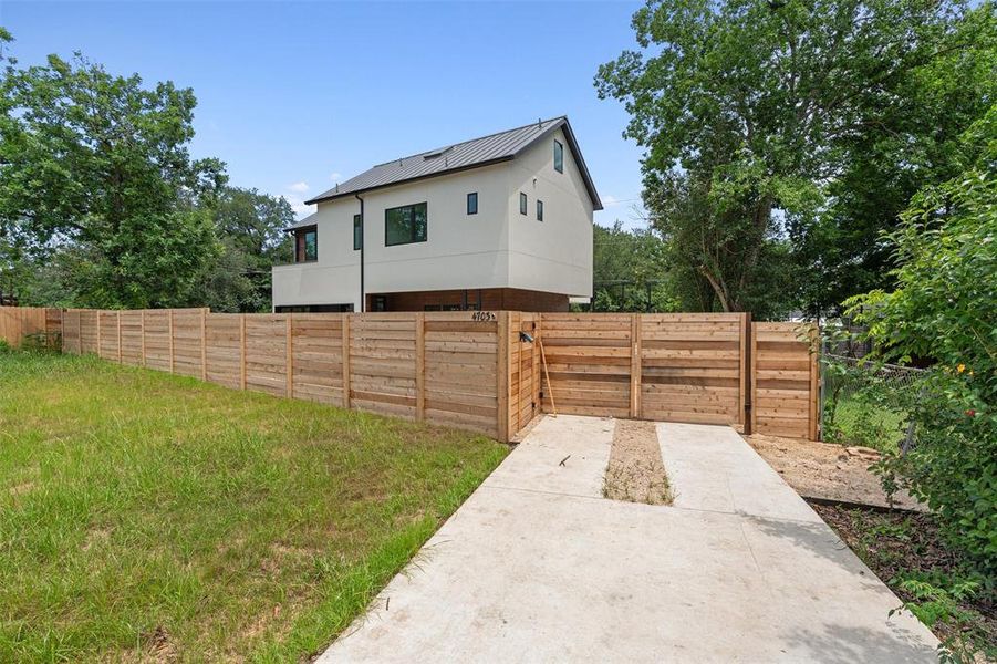 The driveway entry gate is remote controlled.