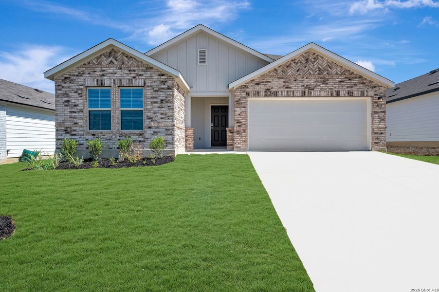 Front exterior of a new home in Greenspoint Heights, Seguin, TX, highlighting curb appeal (Image 1). Front exterior of a new home in Greenspoint Heights, Seguin, TX, highlighting curb appeal (Image 1).