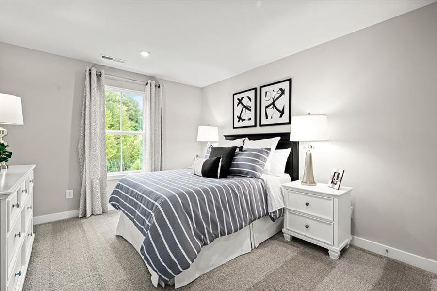 Representative furnished interior of a home built from the Roxbury Grande by Ryan Homes in Griffin Farm Townes, Pittsboro (Image 19).