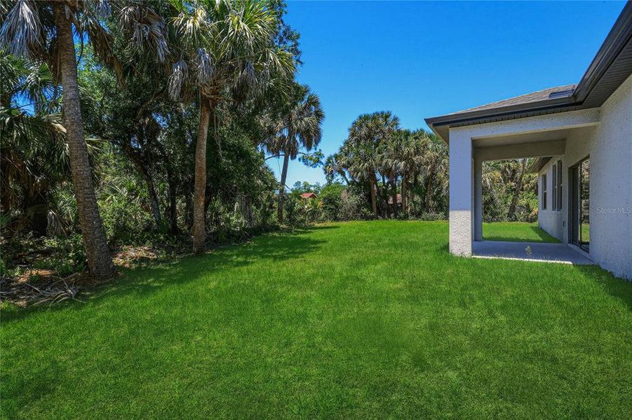 Exterior details and patio area of a home in , North Port (Image 24).