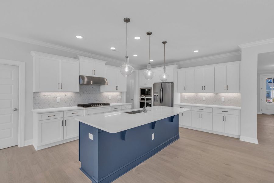 Representative furnished interior of a home built from the The Hampton by RobuckHomes in Windwater, Hampstead (Image 45).