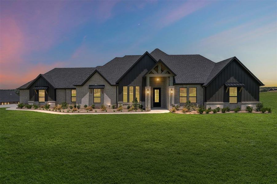 Front exterior of a new home in Santana Ridge, Weatherford, TX, highlighting curb appeal (Image 2). Front exterior of a new home in Santana Ridge, Weatherford, TX, highlighting curb appeal (Image 2).