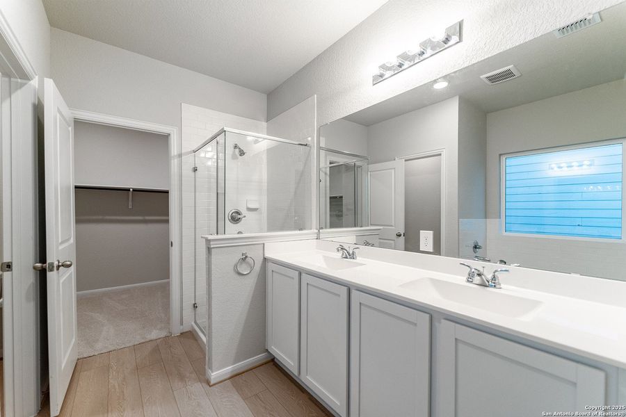 Furnished interior view inside a new home in Hennersby Hollow, San Antonio (Image 9).