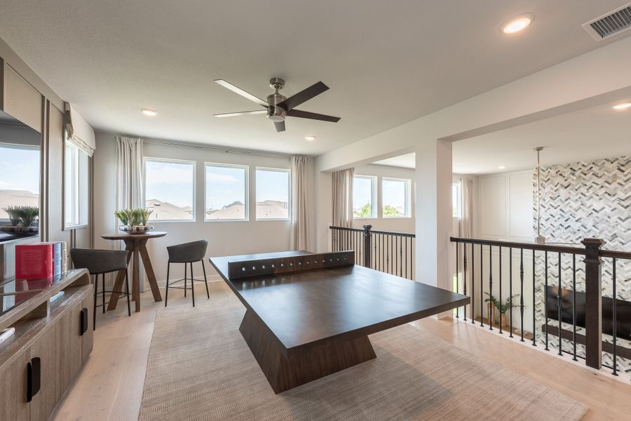 Representative furnished interior of a home built from the Woodbridge by Tri Pointe Homes in Bridgeland, Cypress (Image 33).