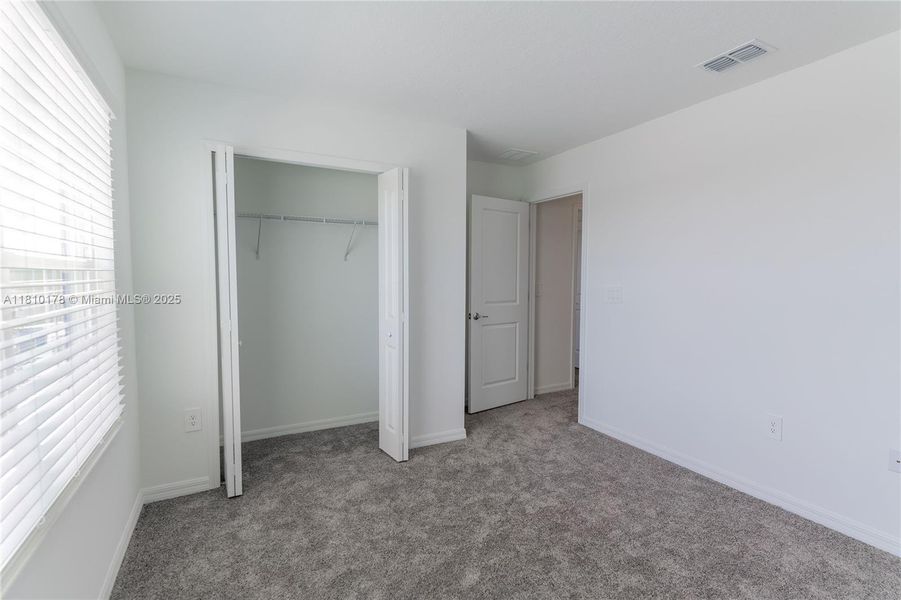 Spacious, unfurnished interior of a new home in Inman Groves, Winter Haven (Image 17). Spacious, unfurnished interior of a new home in Inman Groves, Winter Haven (Image 17).