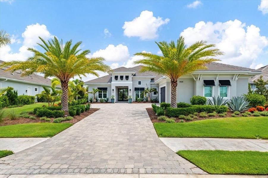 Front exterior of a new home in , Lakewood Ranch, FL, highlighting curb appeal (Image 2). Front exterior of a new home in , Lakewood Ranch, FL, highlighting curb appeal (Image 2).
