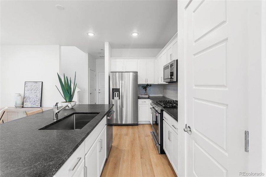 Furnished interior view inside a new home in Painted Prairie, Aurora (Image 6).