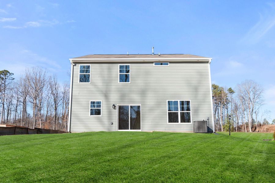 Exterior details and patio area of a home in Chandler Ridge, McLeansville (Image 4).