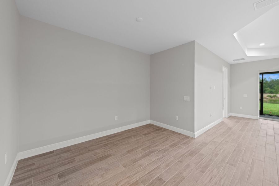 Spacious, unfurnished interior of a new home in Verandah, Fort Myers (Image 24).