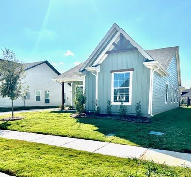 Front exterior of a new home in , Burleson, TX, highlighting curb appeal (Image 17). Front exterior of a new home in , Burleson, TX, highlighting curb appeal (Image 17).