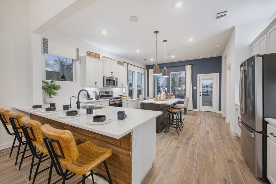 Representative furnished interior of a home built from the Wilshire by Chesmar Homes in Stream Waters, Buda (Image 20).