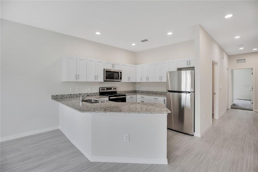 Furnished interior view inside a new home in , Kissimmee (Image 6).