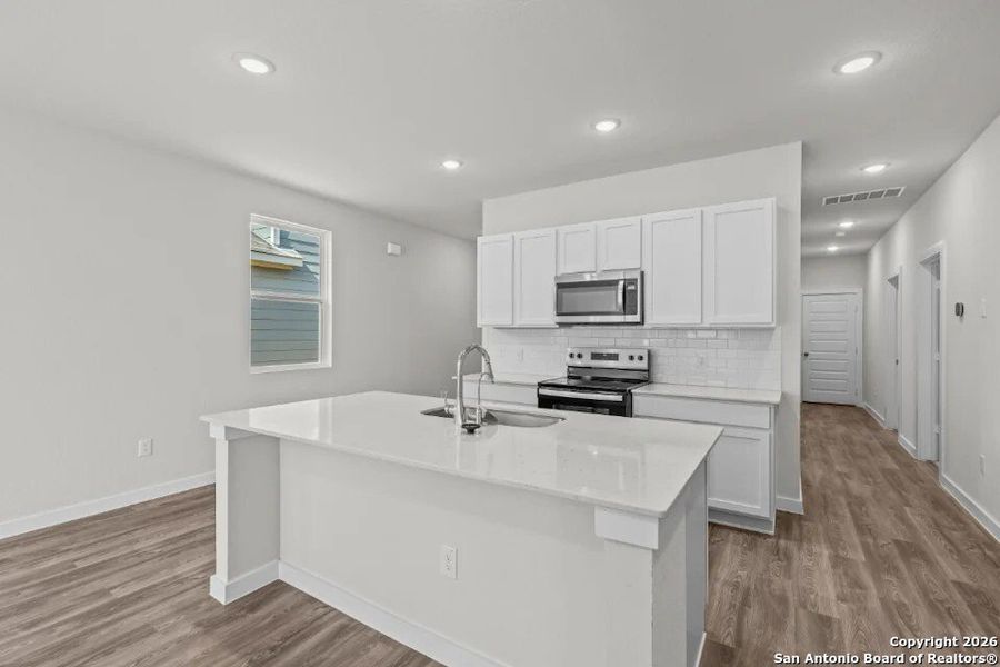 Furnished interior view inside a new home in Agave, San Antonio (Image 7).